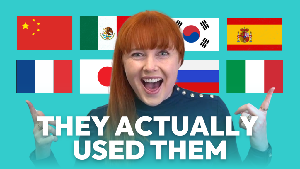 They actually used them, Adelaide smiling pointing fingers at China, France, Japan, South Korea, Russia, Romania, Italy and Mexico Flag